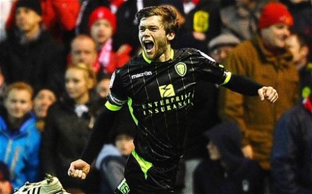 Jonny Howson celebrates at the City Ground