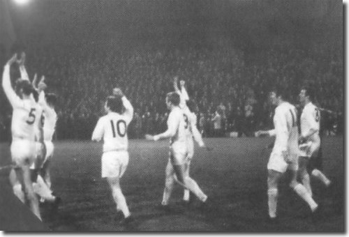 Leeds United's Champions take the tributes of the Liverpool Kop