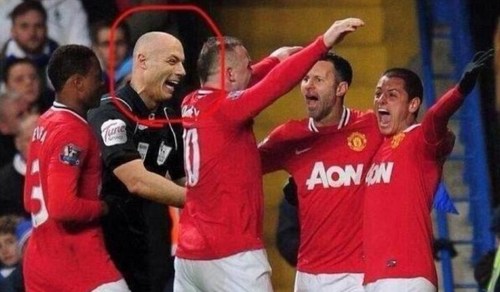 Former Man U favourite Howard Webb celebrates with his team-mates... but at least he wasn't from Manchester