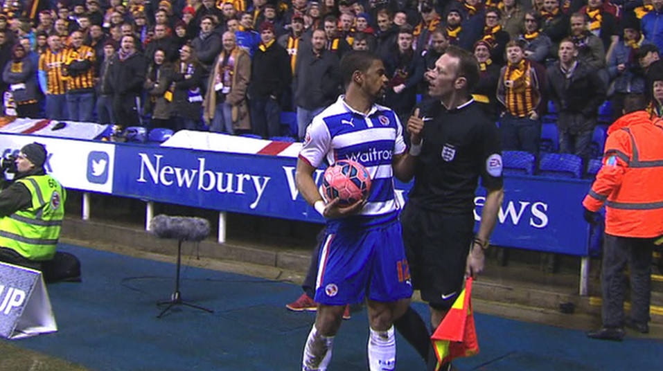 Garath McCleary complains to a match official about abuse from the Bradford support